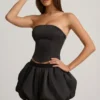 Clemmy Minirock mit Bubble-Saum und mittlerer Leibhöhe in Schwarz Clemmy Minirock mit Bubble-Saum und mittlerer Leibhöhe in Schwarz