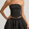 Clemmy Minirock mit Bubble-Saum und mittlerer Leibhöhe in Schwarz Clemmy Minirock mit Bubble-Saum und mittlerer Leibhöhe in Schwarz