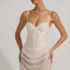 Connie halbtransparentes, verziertes, drapiertes Korsett-Minikleid in Weiß