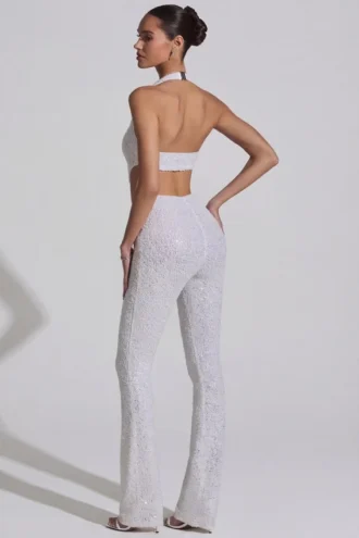 Coralena Jumpsuit mit Verzierungen und Cut-outs in Weiß
