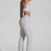 Coralena Jumpsuit mit Verzierungen und Cut-outs in Weiß