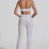 Coralena Jumpsuit mit Verzierungen und Cut-outs in Weiß