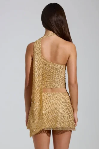 Cosette – Verziertes, asymmetrisches Oberteil mit Schaldetail in Gold