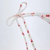 Cove Cheeky-Bikini-Unterteile mit seitlichen Bändern im Kirschprint