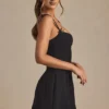 Cressida Minikleid in A-Linie mit Plissee und Schleifendetail in Schwarz Cressida Minikleid in A-Linie mit Plissee und Schleifendetail in Schwarz