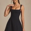 Cressida Minikleid in A-Linie mit Plissee und Schleifendetail in Schwarz Cressida Minikleid in A-Linie mit Plissee und Schleifendetail in Schwarz