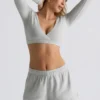 Crop-Top aus gebürstetem Jersey mit V-Ausschnitt in Nebelgrau Crop-Top aus gebürstetem Jersey mit V-Ausschnitt in Nebelgrau