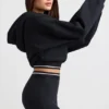 Cropped-Hoodie aus Stretch-Baumwollfleece in Schwarz Cropped-Hoodie aus Stretch-Baumwollfleece in Schwarz