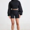 Cropped-Hoodie aus Stretch-Baumwollfleece in Schwarz Cropped-Hoodie aus Stretch-Baumwollfleece in Schwarz