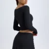 Dalla Modal-Minirock mit Knopfdetails und niedriger Leibhöhe in Schwarz Dalla Modal-Minirock mit Knopfdetails und niedriger Leibhöhe in Schwarz