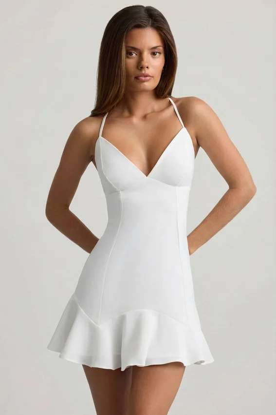 Daria Minikleid mit Schnürung und tiefem Taillenbund in Weiß Daria Minikleid mit Schnürung und tiefem Taillenbund in Weiß