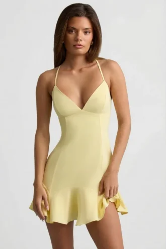 Daria Minikleid mit tiefem Taillenbund und Schnürung in Gelb