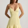 Daria Minikleid mit tiefem Taillenbund und Schnürung in Gelb Daria Minikleid mit tiefem Taillenbund und Schnürung in Gelb