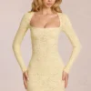 Darla Minikleid mit gewellter Spitze und langen Ärmeln in Zitronengelb