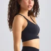 Define Luxe Sport-BH mit Trägern in Schwarz Define Luxe Sport-BH mit Trägern in Schwarz