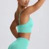 Define Luxe Sport-BH mit V-Ausschnitt in Mint Define Luxe Sport-BH mit V-Ausschnitt in Mint
