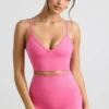 Define Luxe Sport-BH mit V-Ausschnitt in Pink Define Luxe Sport-BH mit V-Ausschnitt in Pink