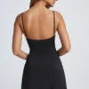 Deia A-Linien-Minikleid mit Metallverzierungen in Schwarz Deia A-Linien-Minikleid mit Metallverzierungen in Schwarz