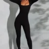 Delanie Jumpsuit mit quadratischem Ausschnitt und langen Ärmeln in Schwarz