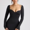 Demelza Minikleid mit langen Ärmeln und Herzausschnitt in Schwarz Demelza Minikleid mit langen Ärmeln und Herzausschnitt in Schwarz