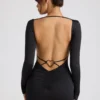 Demelza Minikleid mit langen Ärmeln und Herzausschnitt in Schwarz Demelza Minikleid mit langen Ärmeln und Herzausschnitt in Schwarz