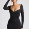 Demelza Minikleid mit langen Ärmeln und Herzausschnitt in Schwarz Demelza Minikleid mit langen Ärmeln und Herzausschnitt in Schwarz