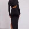 Desdemona Maxikleid mit Kapuze und langen Ärmeln in Schwarz Desdemona Maxikleid mit Kapuze und langen Ärmeln in Schwarz