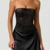 Eden – Verziertes, drapiertes, trägerloses A-Linien-Minikleid in Schwarz Eden – Verziertes, drapiertes, trägerloses A-Linien-Minikleid in Schwarz
