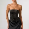 Eden – Verziertes, drapiertes, trägerloses A-Linien-Minikleid in Schwarz Eden – Verziertes, drapiertes, trägerloses A-Linien-Minikleid in Schwarz