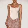 Eira Satin-Korsett-Minikleid mit verziertem Rock in Roségold Eira Satin-Korsett-Minikleid mit verziertem Rock in Roségold