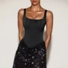 Eira Satin-Korsett-Minikleid mit verziertem Rock in Schwarz-Lila Eira Satin-Korsett-Minikleid mit verziertem Rock in Schwarz-Lila