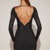Eirlys Minikleid aus transparenter Spitze mit U-Boot-Ausschnitt in Schwarz Eirlys Minikleid aus transparenter Spitze mit U-Boot-Ausschnitt in Schwarz