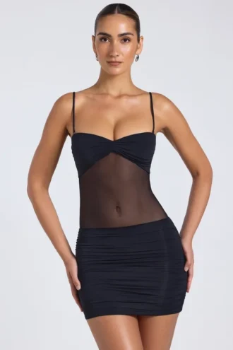 Eislyn Minikleid mit transparenten Einsätzen und Rüschen in Schwarz