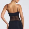 Eislyn Minikleid mit transparenten Einsätzen und Rüschen in Schwarz Eislyn Minikleid mit transparenten Einsätzen und Rüschen in Schwarz