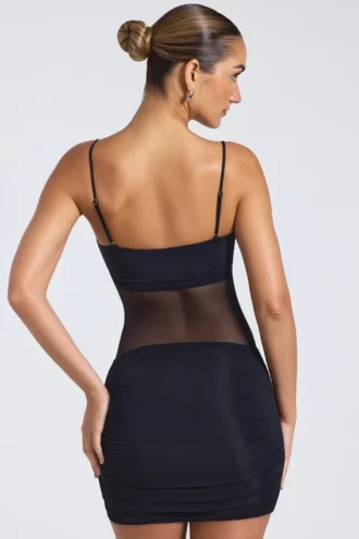 Eislyn Minikleid mit transparenten Einsätzen und Rüschen in Schwarz