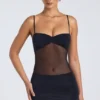 Eislyn Minikleid mit transparenten Einsätzen und Rüschen in Schwarz Eislyn Minikleid mit transparenten Einsätzen und Rüschen in Schwarz