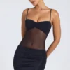 Eislyn Minikleid mit transparenten Einsätzen und Rüschen in Schwarz Eislyn Minikleid mit transparenten Einsätzen und Rüschen in Schwarz
