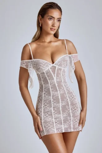 Eleonora – Transparentes A-Linien-Minikleid aus Spitze in Elfenbein