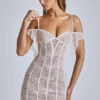 Eleonora – Transparentes A-Linien-Minikleid aus Spitze in Elfenbein Eleonora – Transparentes A-Linien-Minikleid aus Spitze in Elfenbein