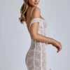 Eleonora – Transparentes A-Linien-Minikleid aus Spitze in Elfenbein Eleonora – Transparentes A-Linien-Minikleid aus Spitze in Elfenbein
