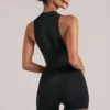 Elin Romper mit hohem Ausschnitt in Schwarz Elin Romper mit hohem Ausschnitt in Schwarz
