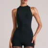 Elin Romper mit hohem Ausschnitt in Schwarz Elin Romper mit hohem Ausschnitt in Schwarz