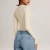 Elodie Modal Plunge Langarm-Bodys in Elfenbein Elodie Modal Plunge Langarm-Bodys in Elfenbein