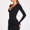 Elona Geripptes Modal-Minikleid mit langen Ärmeln und Drapierung in Schwarz Elona Geripptes Modal-Minikleid mit langen Ärmeln und Drapierung in Schwarz