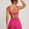 Emilion verziertes Minikleid mit Cut-outs in Fuchsia Emilion verziertes Minikleid mit Cut-outs in Fuchsia