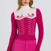 Eng anliegendes Langarm-Oberteil aus Strick in Magenta-Pink Eng anliegendes Langarm-Oberteil aus Strick in Magenta-Pink