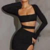 Enya Langarm-Minikleid mit Cut-outs in Schwarz Enya Langarm-Minikleid mit Cut-outs in Schwarz