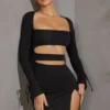 Enya Langarm-Minikleid mit Cut-outs in Schwarz Enya Langarm-Minikleid mit Cut-outs in Schwarz
