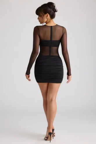 Essie Transparentes Minikleid mit Einsätzen und langen Ärmeln in Schwarz