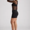 Essie Transparentes Minikleid mit Einsätzen und langen Ärmeln in Schwarz